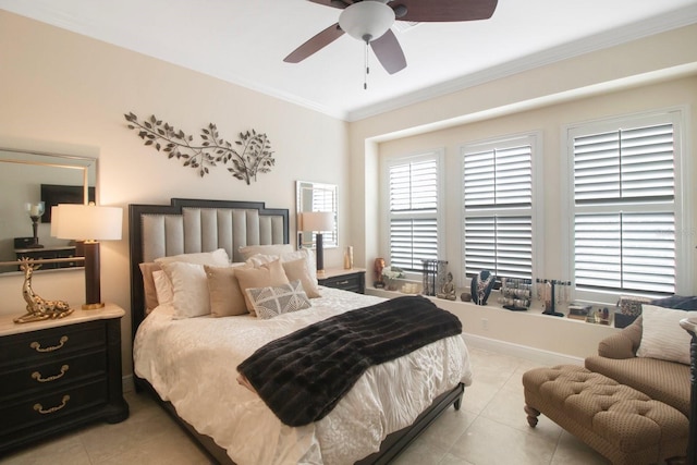 tiled bedroom with multiple windows, ornamental molding, and ceiling fan