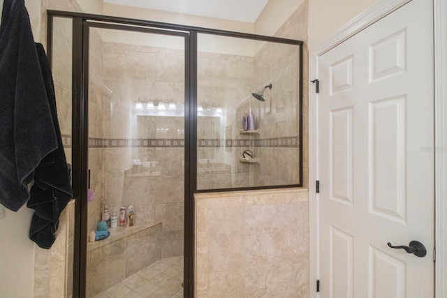 bathroom featuring an enclosed shower