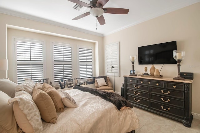 bedroom featuring light tile patterned floors, crown molding, and ceiling fan