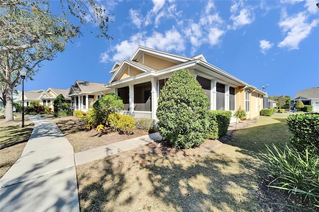 view of front of property with a front lawn