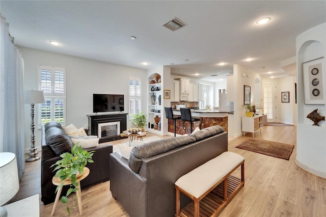 living room with light wood-type flooring