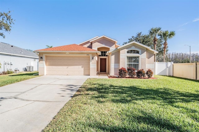 view of front of home featuring a garage, central air condition unit, and a front lawn