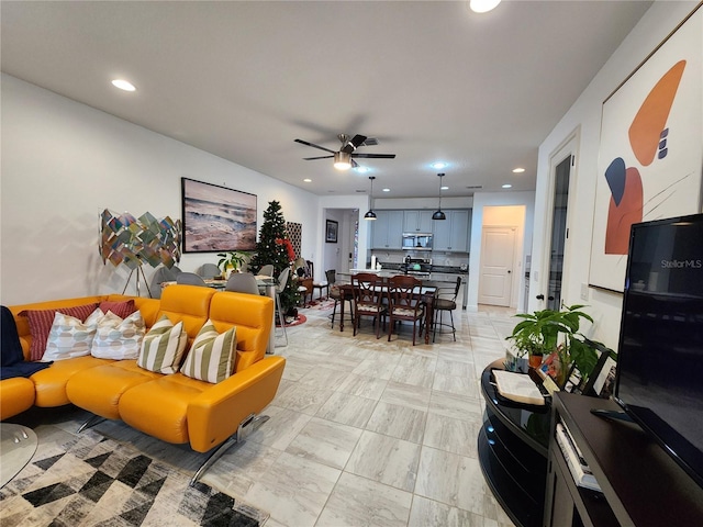 living room featuring ceiling fan