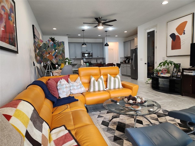 living room featuring ceiling fan