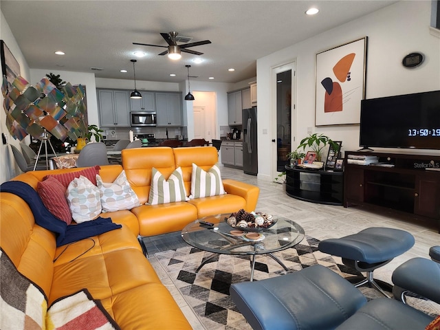 living room with ceiling fan