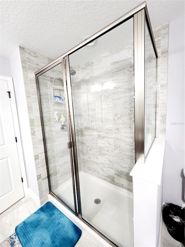 bathroom featuring walk in shower