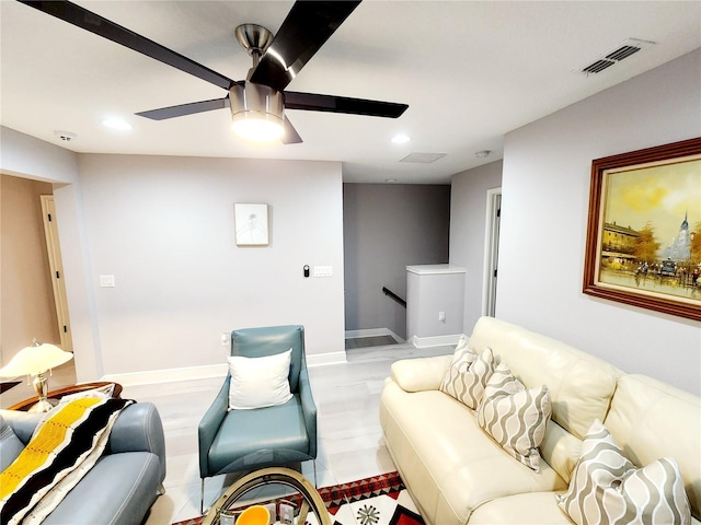 living room with ceiling fan