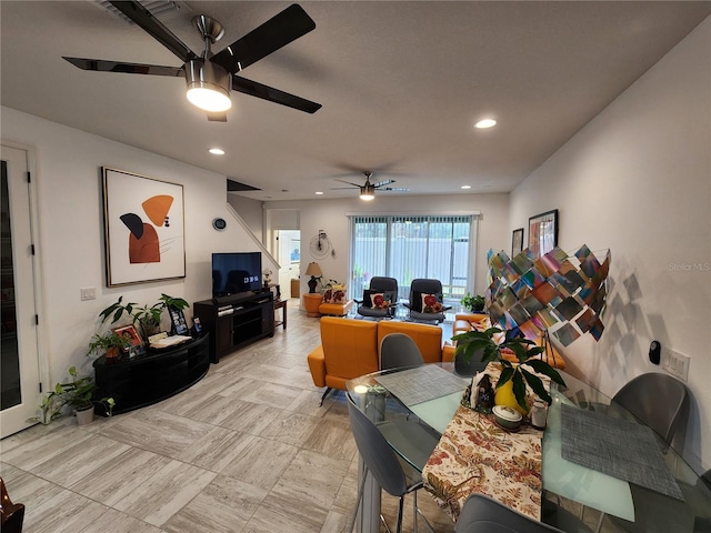 dining space featuring ceiling fan