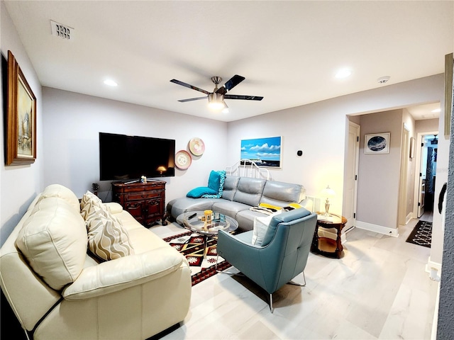 living room with ceiling fan