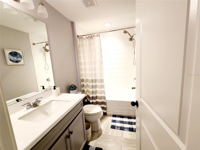 full bathroom with shower / bath combo with shower curtain, toilet, and vanity