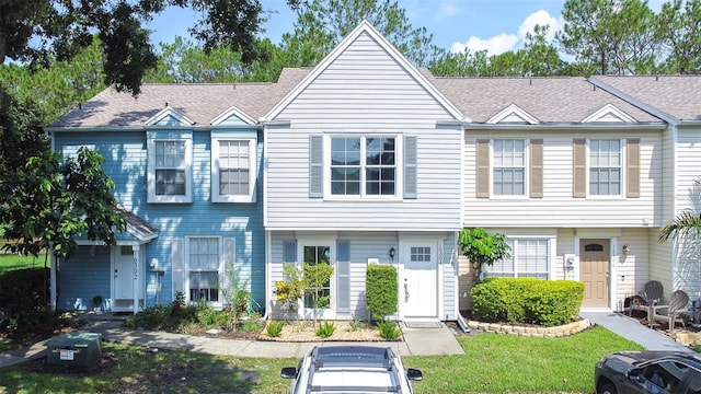 view of property with a front lawn