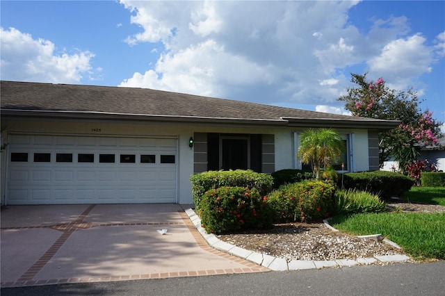 single story home with a garage