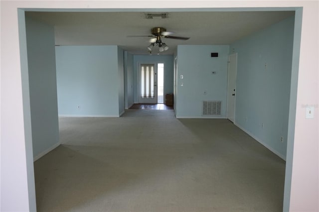 spare room with ceiling fan