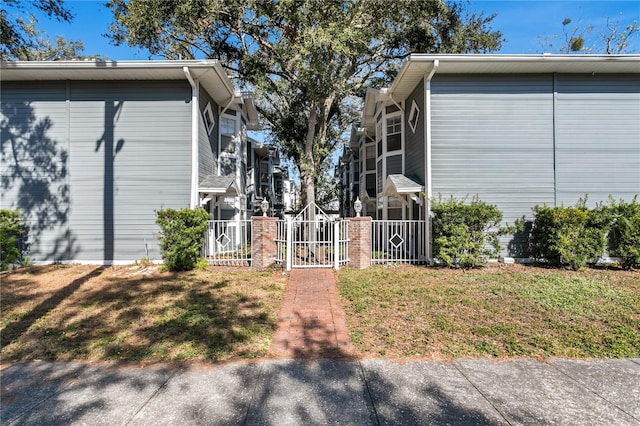 view of home's exterior with a yard