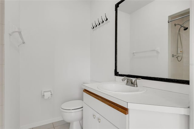 bathroom with vanity, walk in shower, tile patterned floors, and toilet