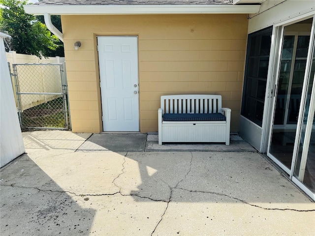 property entrance featuring a patio