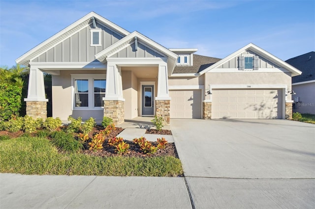 craftsman-style home featuring a porch and a garage