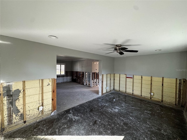 unfurnished room featuring ceiling fan