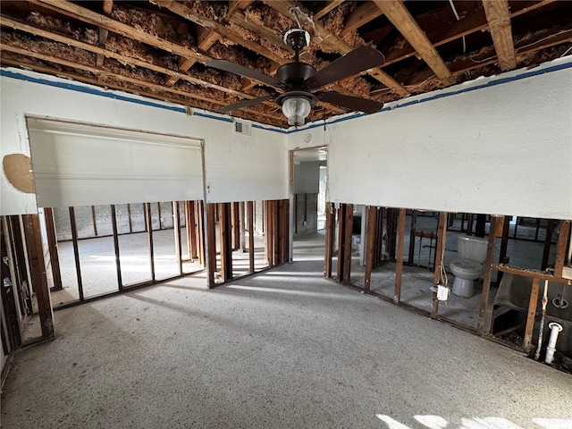 basement featuring ceiling fan