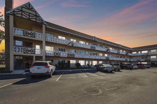 view of outdoor building at dusk