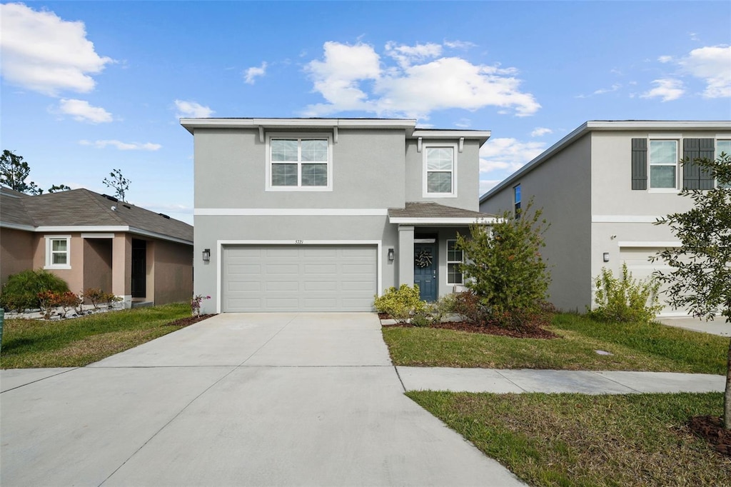 front of property featuring a garage