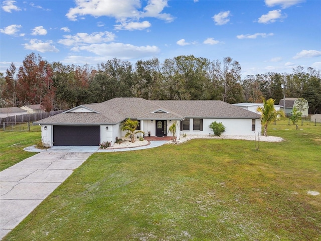 ranch-style house with a front yard and a garage