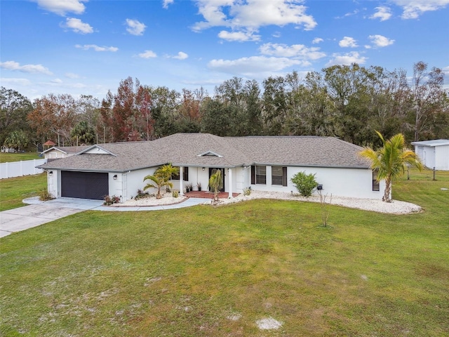 single story home with a garage and a front yard