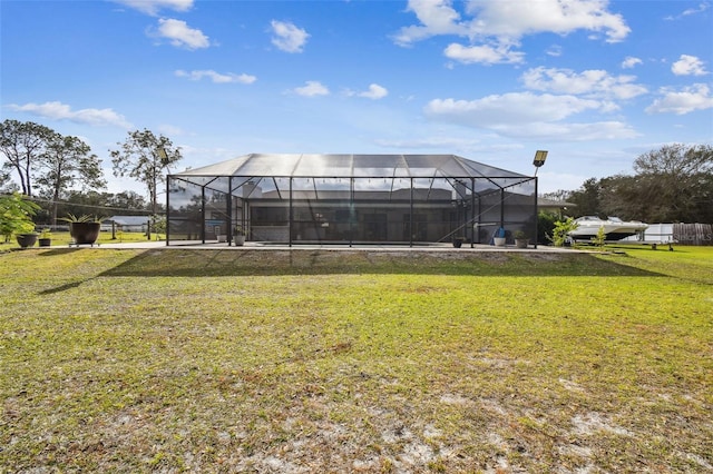 view of yard featuring glass enclosure