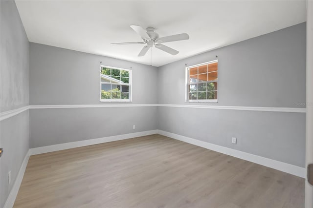 unfurnished room featuring ceiling fan and light hardwood / wood-style flooring