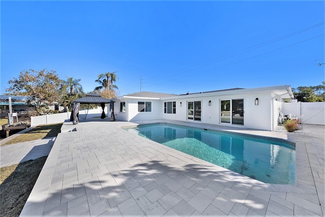 view of pool featuring a gazebo and a patio area