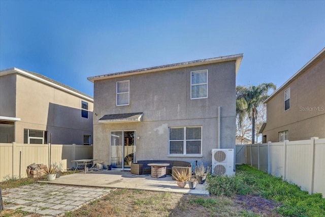 rear view of house with a patio area