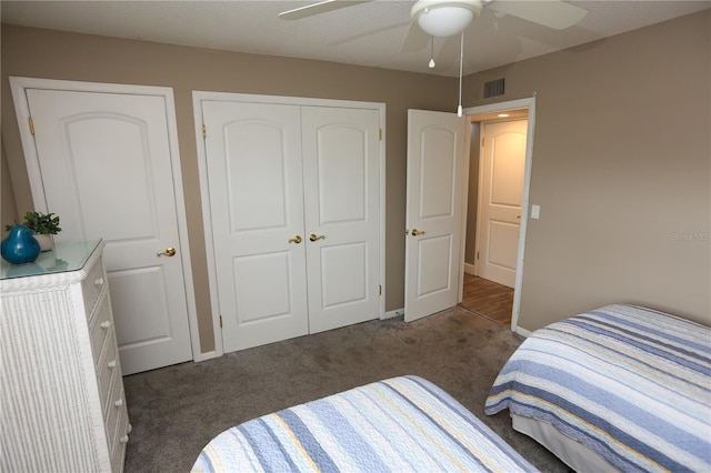 carpeted bedroom with ceiling fan