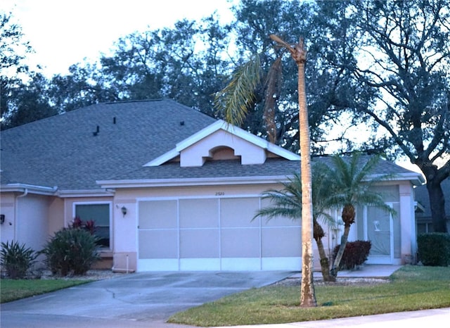 2320 Marksmen Ct Unit 205, Sun City Center, FL 33573 - view of front of property with a garage