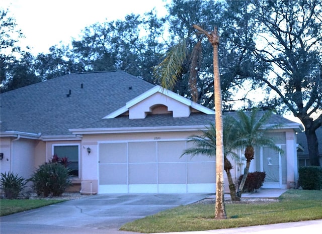 view of front of property with a garage