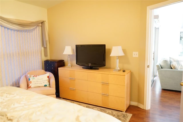 bedroom featuring hardwood / wood-style flooring