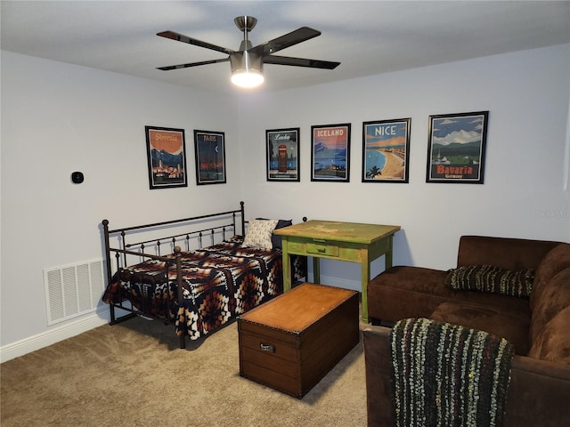 bedroom with ceiling fan and light colored carpet