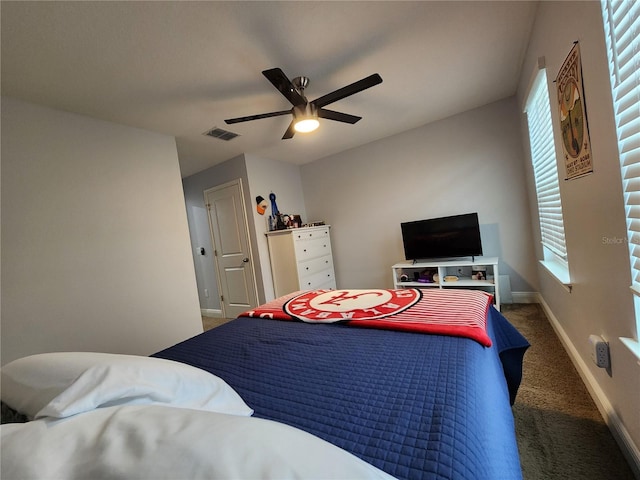 carpeted bedroom featuring ceiling fan