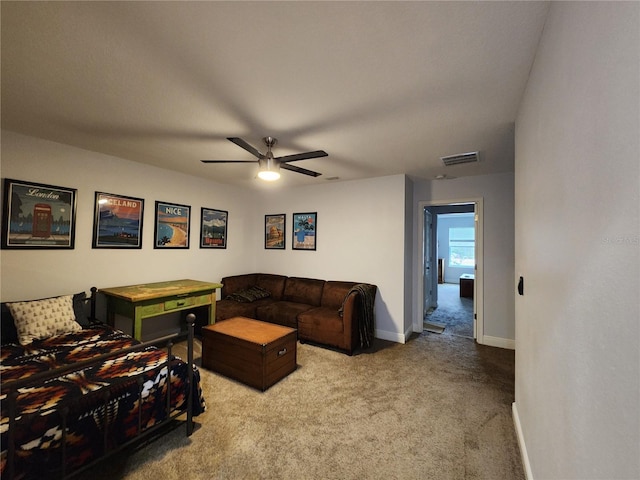 carpeted bedroom featuring ceiling fan