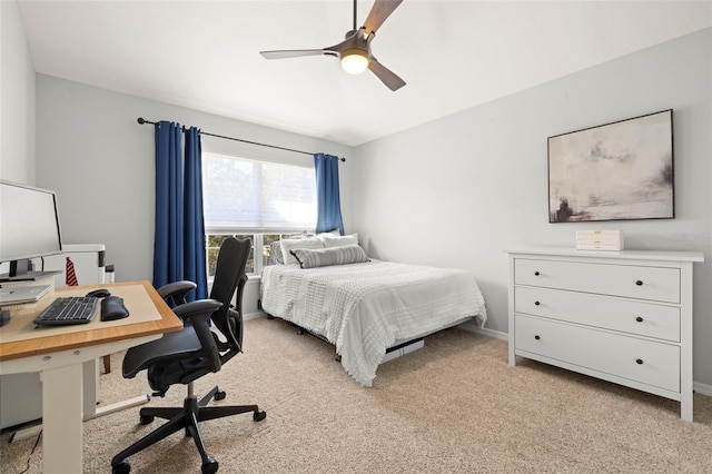 7001 Interbay Blvd Unit 313, Tampa, FL 33616 - bedroom featuring light colored carpet, a ceiling fan, and baseboards