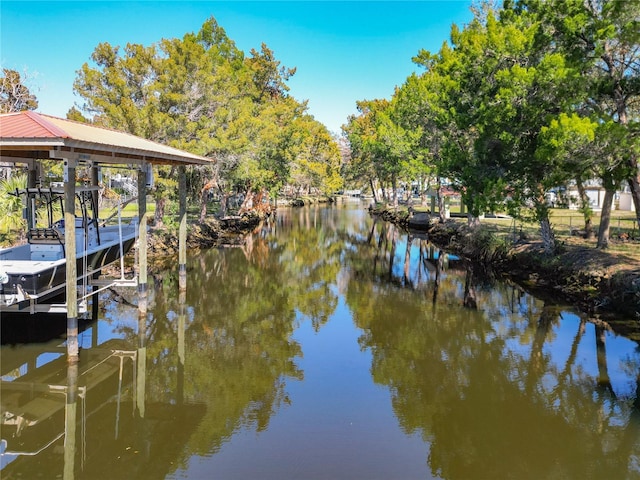 view of dock with a water view