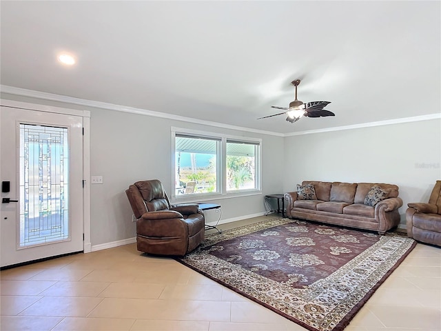 tiled living room featuring ceiling fan and ornamental molding