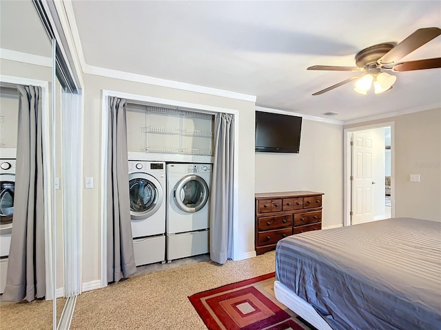 bedroom with independent washer and dryer, ceiling fan, and ornamental molding