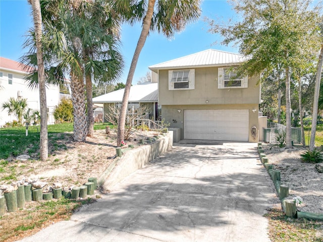 view of front of home with a garage