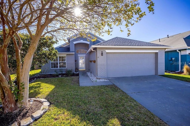 single story home featuring a front lawn and a garage