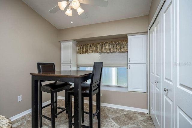 dining area with ceiling fan