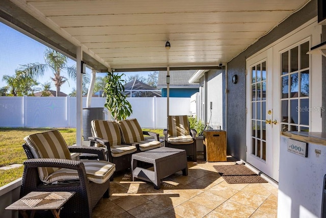 view of patio with french doors and outdoor lounge area