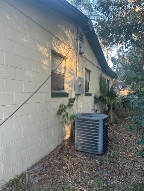 view of property exterior with cooling unit