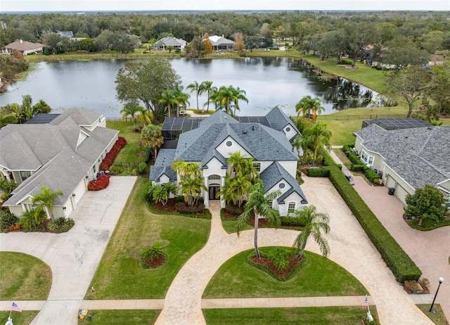 drone / aerial view with a water view