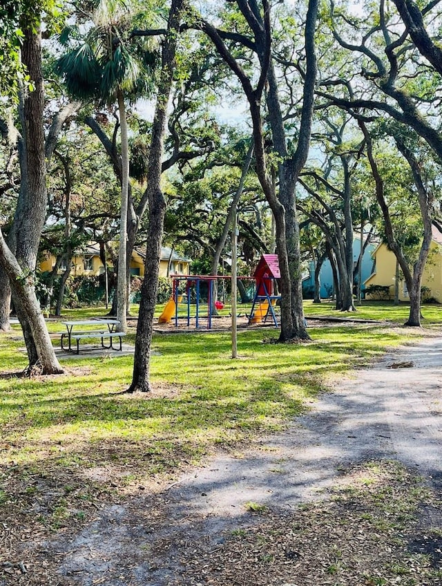 surrounding community featuring a playground