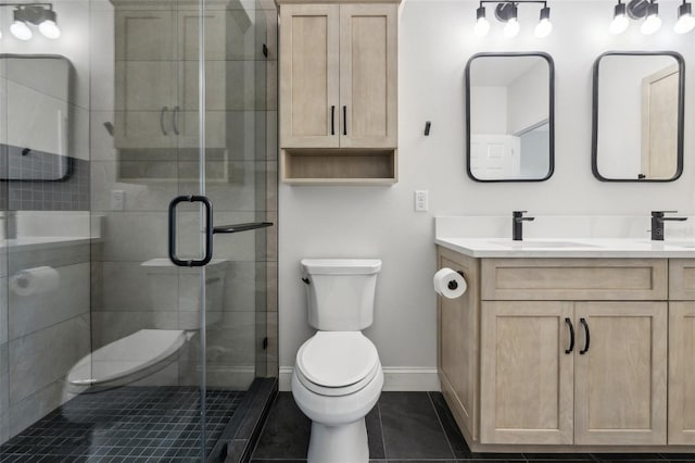 bathroom featuring tile patterned flooring, vanity, toilet, and walk in shower